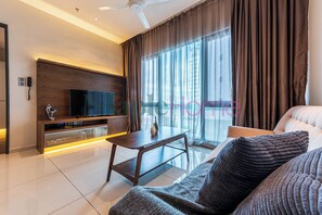Family Suite, 3 Bedrooms, Balcony | Living area | 40-inch flat-screen TV with cable channels, TV, table tennis - Geo38 Premier Suites Genting Highlands (Genting Highlands)