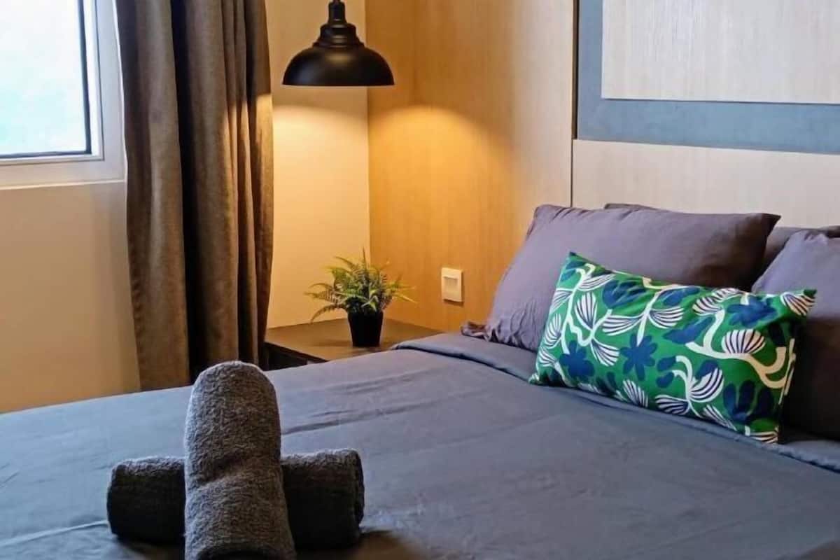 2 bedrooms, desk, blackout curtains, iron/ironing board