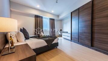 2 bedrooms, desk, blackout curtains, iron/ironing board