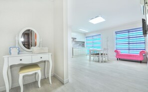 Deluxe Room (Soda) | Living area | Flat-screen TV, heated floors
