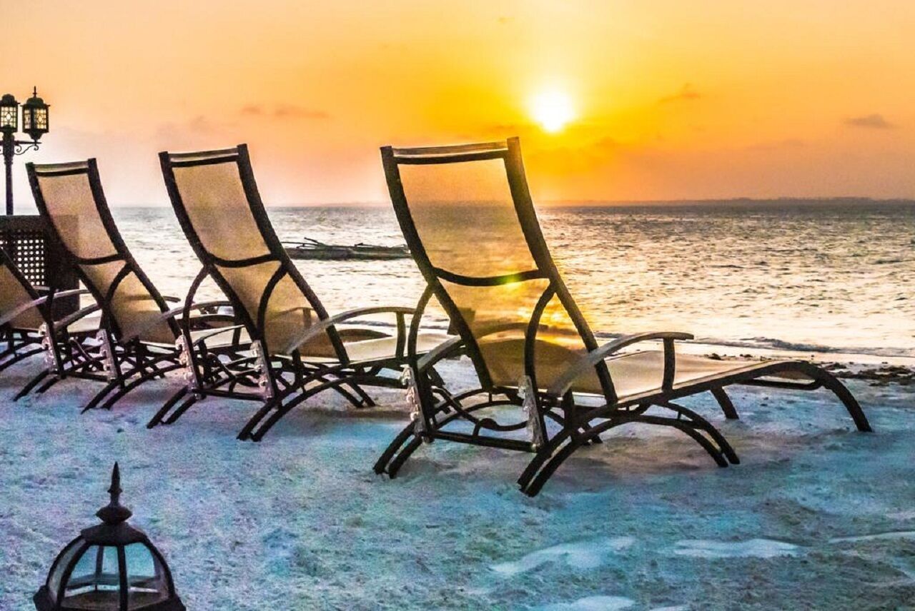 Private beach, white sand, sun loungers, beach umbrellas