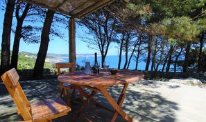 Outdoor dining - Romantic trullo with sea access and stunning views (house G) (Castro)