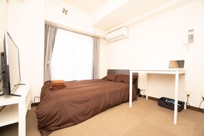 アパートメント (403) | 客室ごとに異なる装飾、客室ごとに異なるインテリア、ノートパソコン用作 業スペース、アイロン / アイロン台