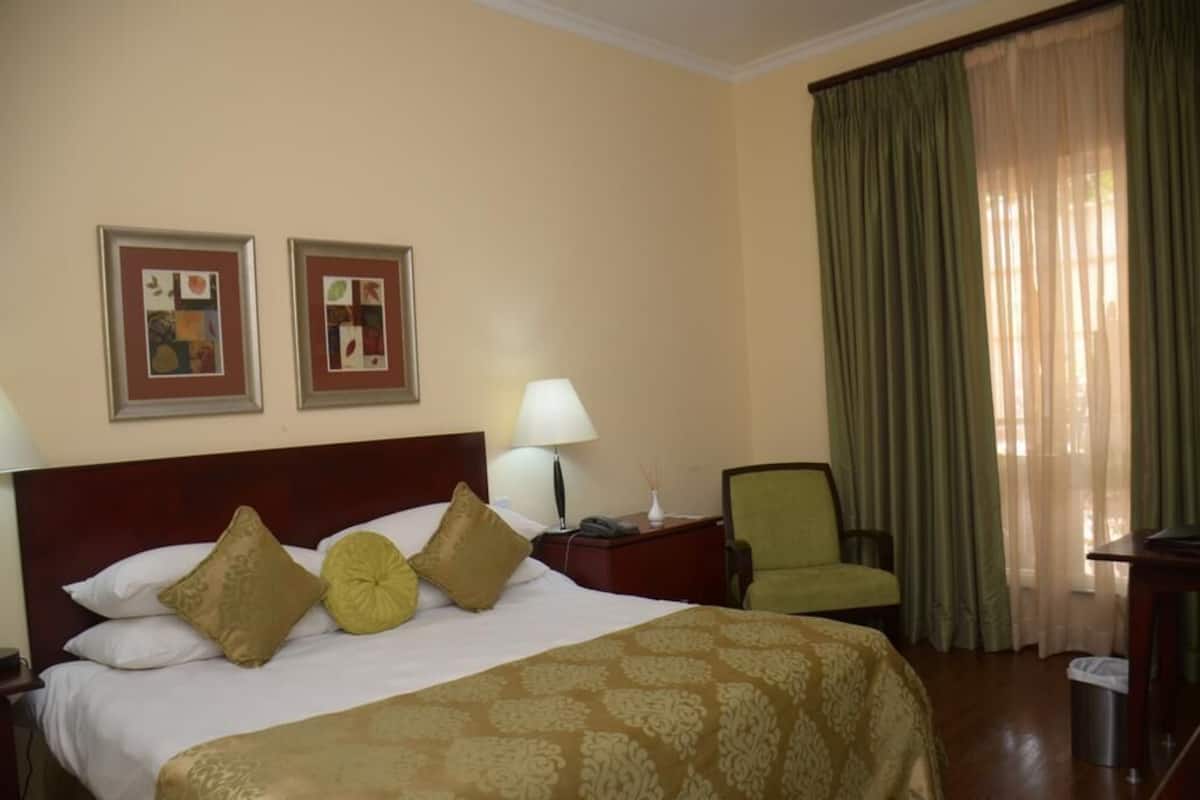 classic room | in-room safe, desk, laptop workspace, iron/ironing board