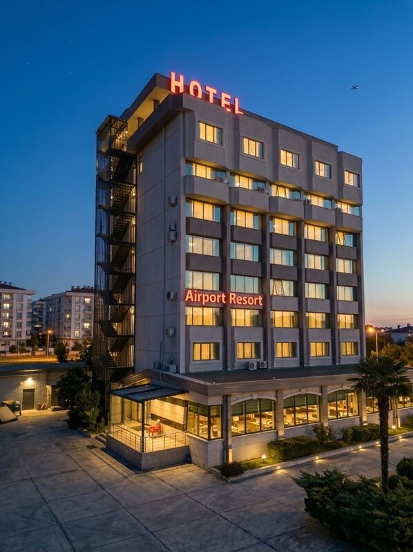 A multi-story hotel with a prominent 'HOTEL' sign and 'Airport Resort' branding. - Samsun Airport Resort Hotel (Tekkekoy)