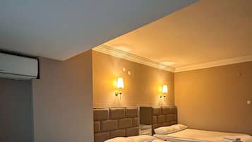 Family Room | 1 bedroom, laptop workspace, free WiFi, bed sheets