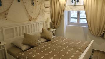 Lejlighed - 2 soveværelser | 2 soveværelser, premium-sengetøj, gratis minibar, individuelt design