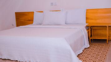 Egyptian cotton sheets, premium bedding, down duvets, free minibar