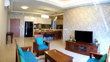 Apartment, 3 Bedrooms | Living area | 50-inch Smart TV with digital channels, TV