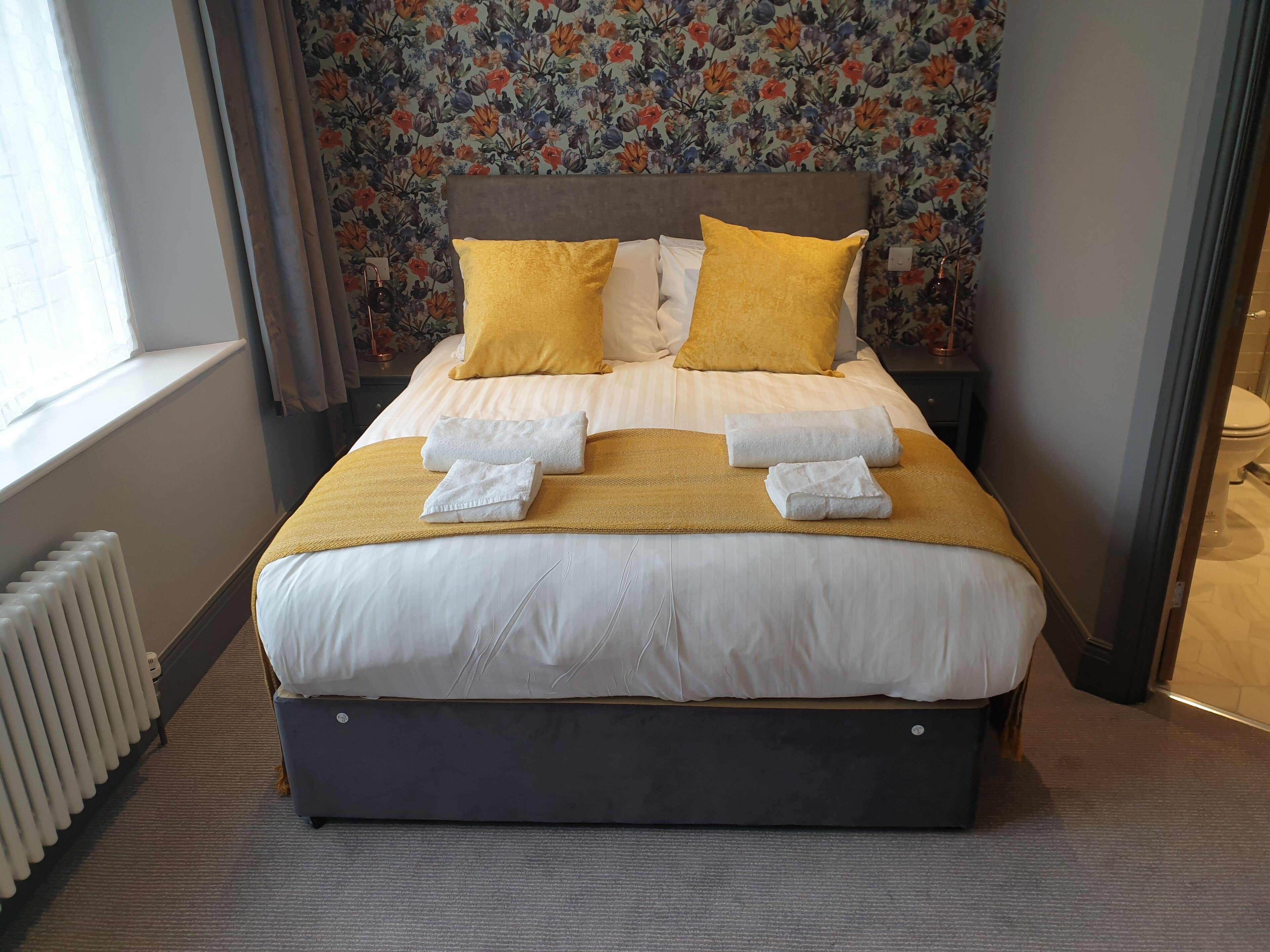 desk, laptop workspace, blackout curtains, iron/ironing board