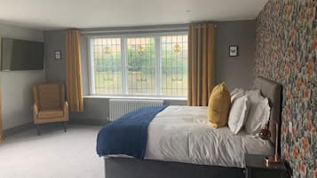 Desk, laptop workspace, blackout curtains, iron/ironing board