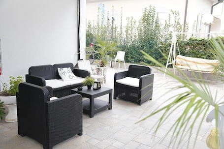 Terrace/patio. Hotel Villa Dina