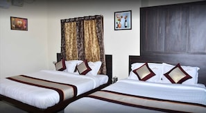 Geluiddichte muren, een strijkplank/strijkijzer, gratis wifi, beddengoed