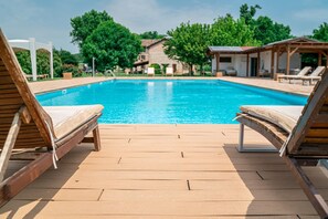 Seasonal outdoor pool, pool umbrellas, sun loungers