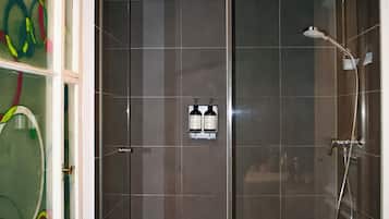 Family Room | Bathroom | Designer toiletries, hair dryer, towels, soap