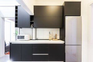 Apartment, 2 Bedrooms, Non Smoking | Private kitchen | Full-sized fridge, microwave, oven, stovetop - Rato Design With Terrace By Homing (Lisbon)