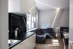 Chambre supérieure, non-fumeur, cuisinette | Repas dans la chambre