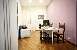 Apartment, 2 Bedrooms | Living area | TV