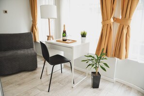 Standard Double or Twin Room | Minibar, in-room safe, desk, laptop workspace