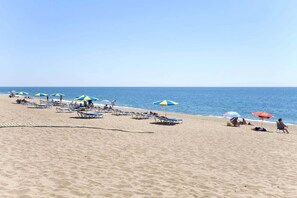 On the beach, beach towels