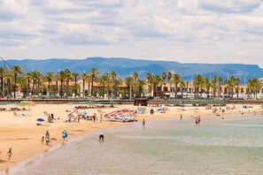 On the beach, beach towels