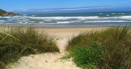 Suítes Completas a 90m da Praia