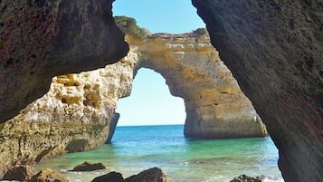 On the beach, sun-loungers, beach towels