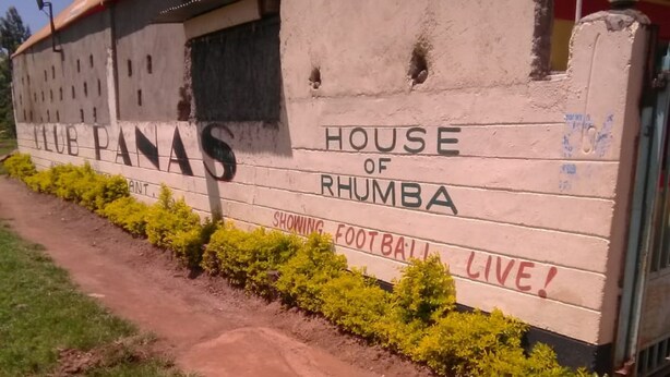 A sign for Club Panas House of Rhumba advertising live football broadcasts. - Club Panas (Bondo)