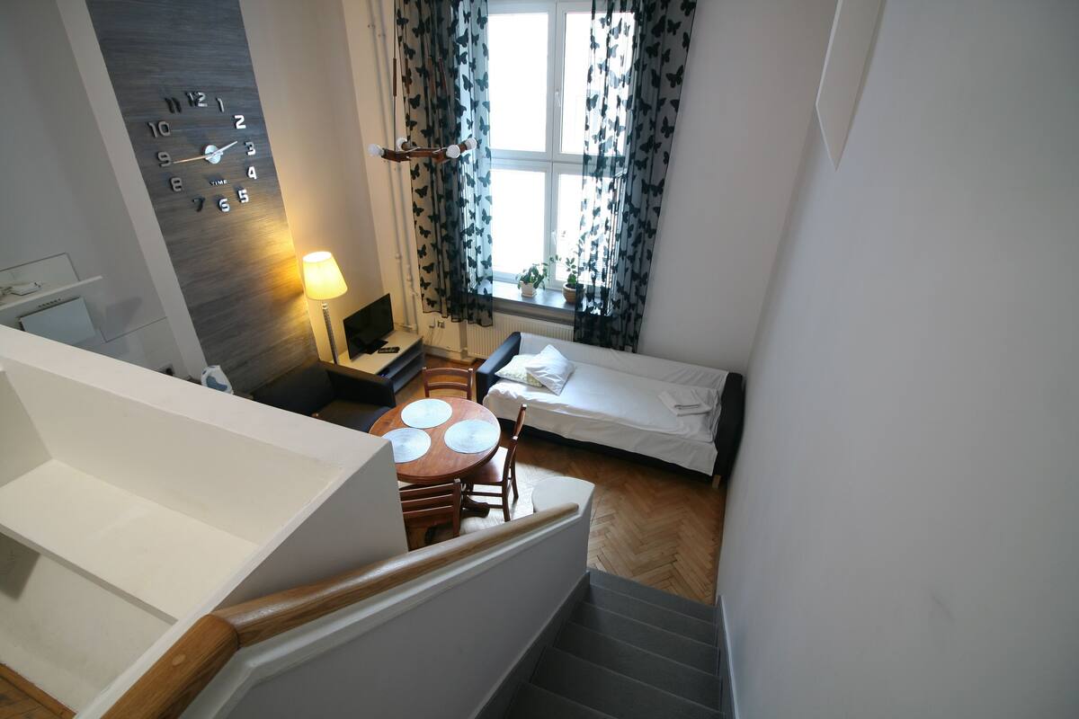 Basic Apartment | Living area | 32-inch flat-screen TV with cable channels, TV