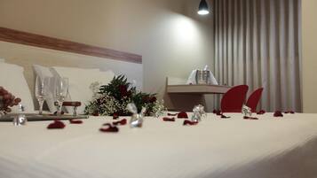 Minibar, desk, laptop workspace, iron/ironing board