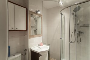 Hair dryer, towels, soap, shampoo