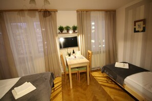 Classic Studio Suite | Living area | 32-inch flat-screen TV with cable channels, TV - Apartamenty Varsovie Superb Panska 5 (Warsaw)