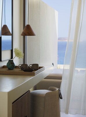 Premium bedding, down comforters, minibar, in-room safe