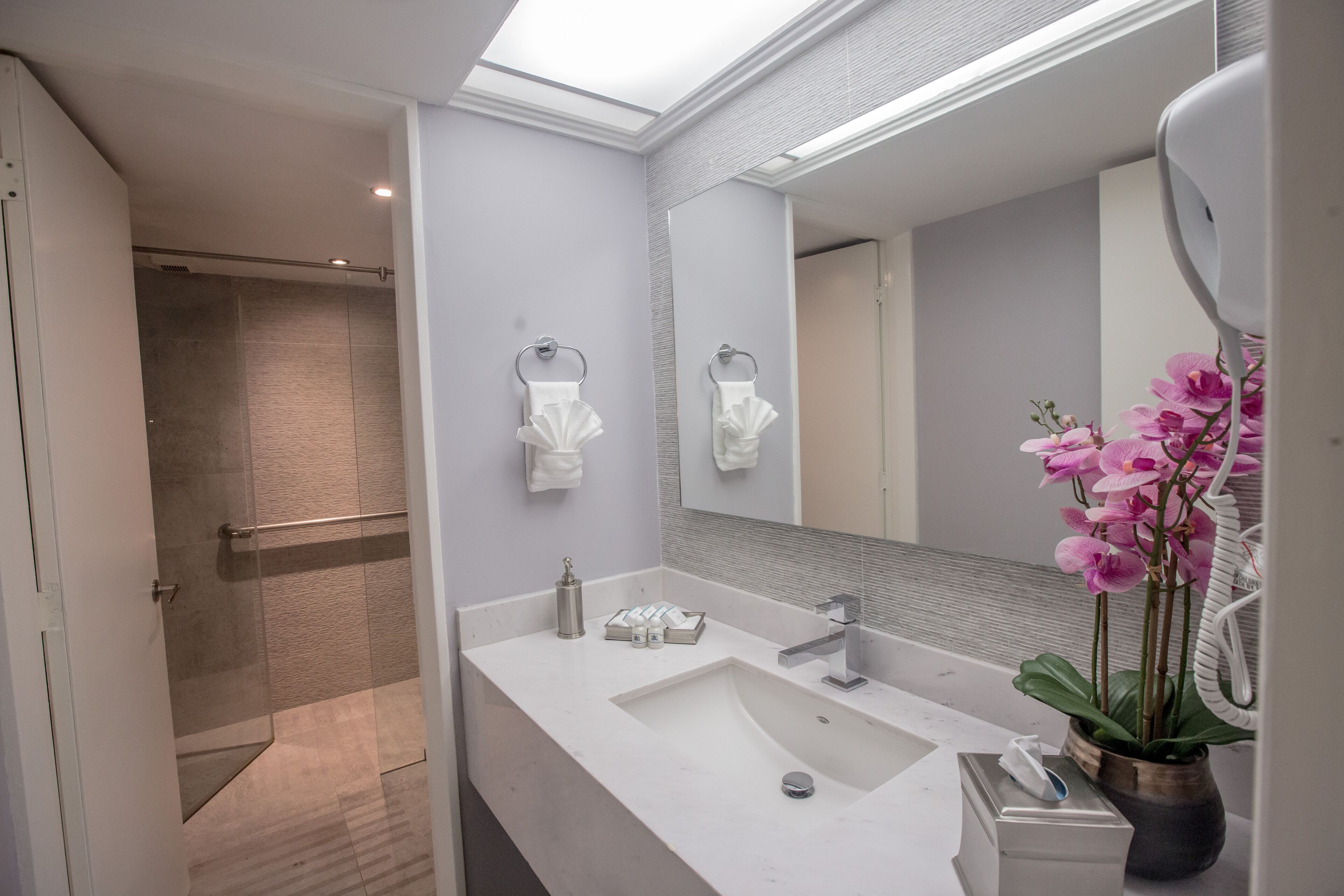 junior suite | bathroom | shower, towels, soap, shampoo