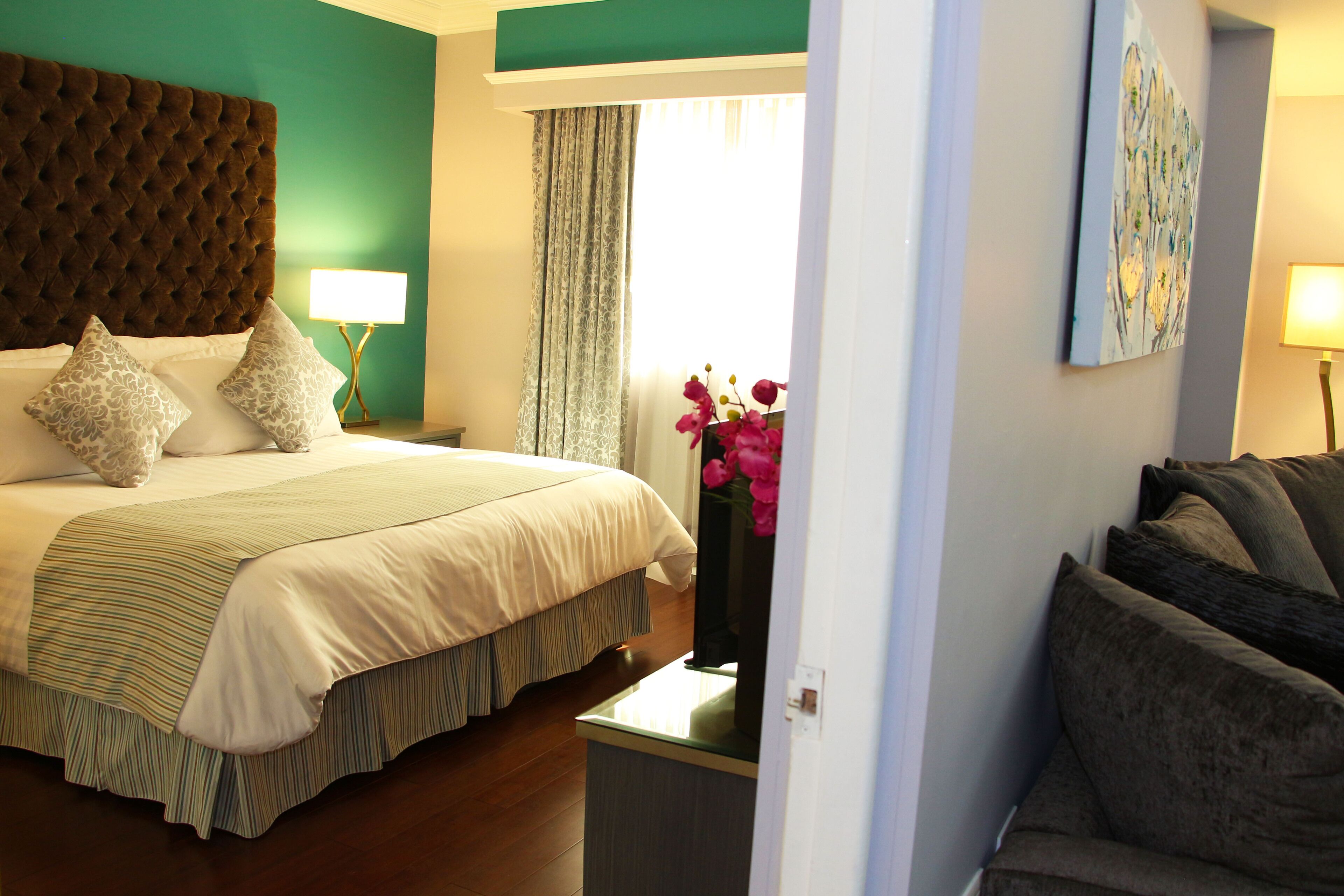 junior suite | 1 bedroom, in-room safe, desk, laptop workspace