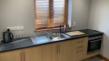 House (1 Bedroom) | Private kitchen | Fridge, oven, stovetop, coffee/tea maker