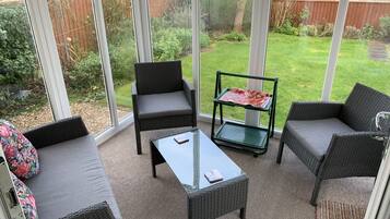 House (3 Bedrooms) | Living room | TV, fireplace