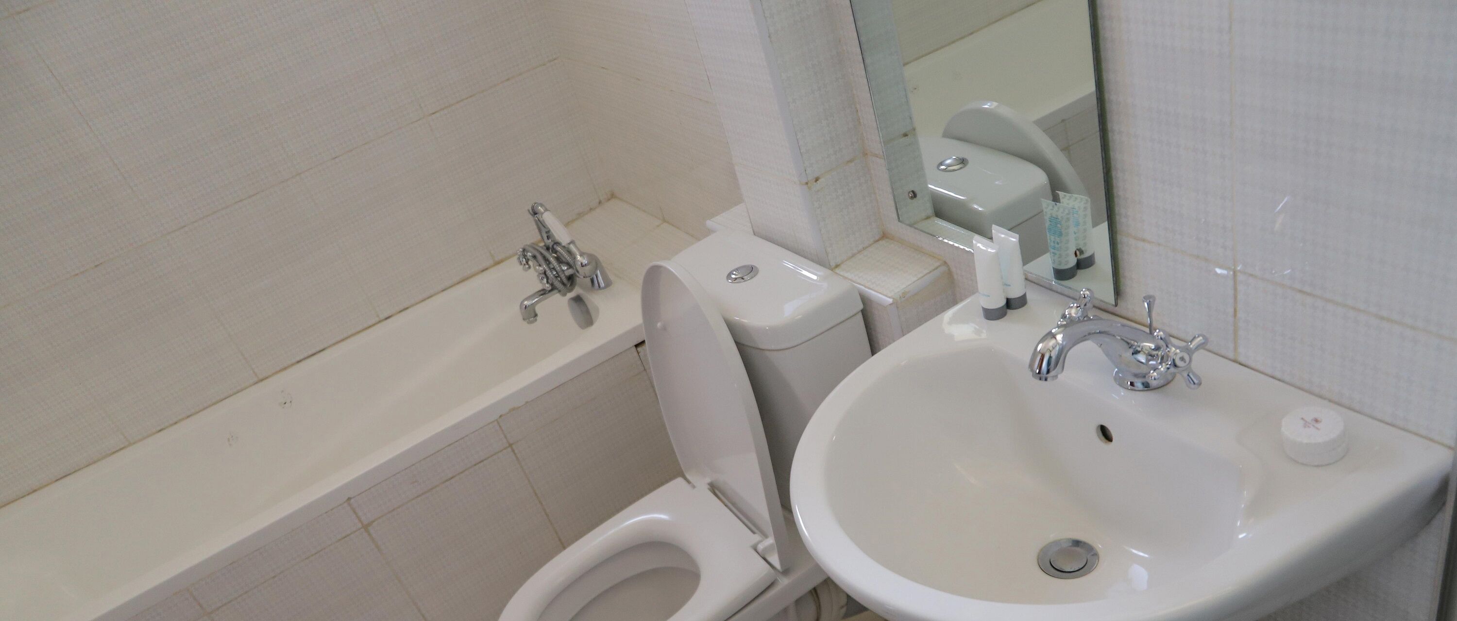 double room | bathroom | rainfall showerhead, towels, soap, toilet paper