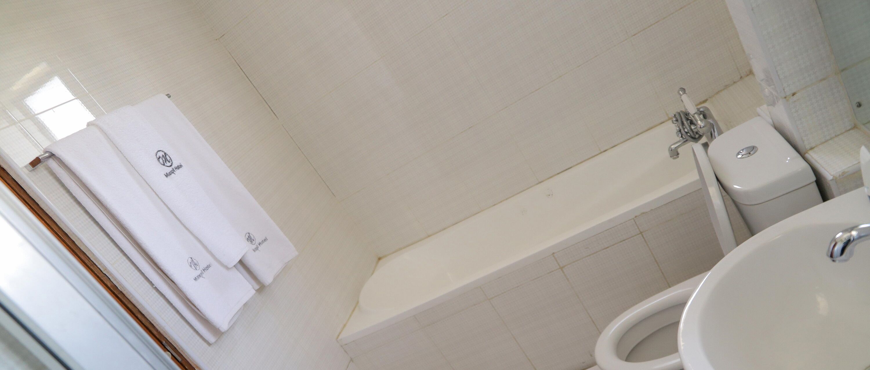 twin room | bathroom | rainfall showerhead, towels, soap, toilet paper