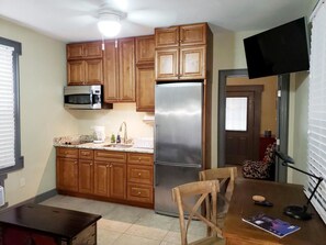 Fridge, microwave, oven, stovetop - Camellia 1 bdrm Patio apt. at Crescent Moon Villas (Gretna)