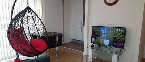 Apartment, 2 Bedrooms | Living room | Flat-screen TV