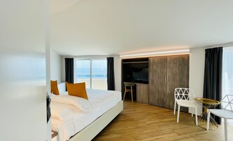 Deluxe Double Room | Down comforters, minibar, in-room safe, laptop workspace