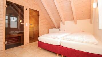 Blackout curtains, soundproofing, iron/ironing board, travel cot