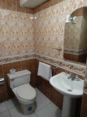 Shower, free toiletries, towels, soap