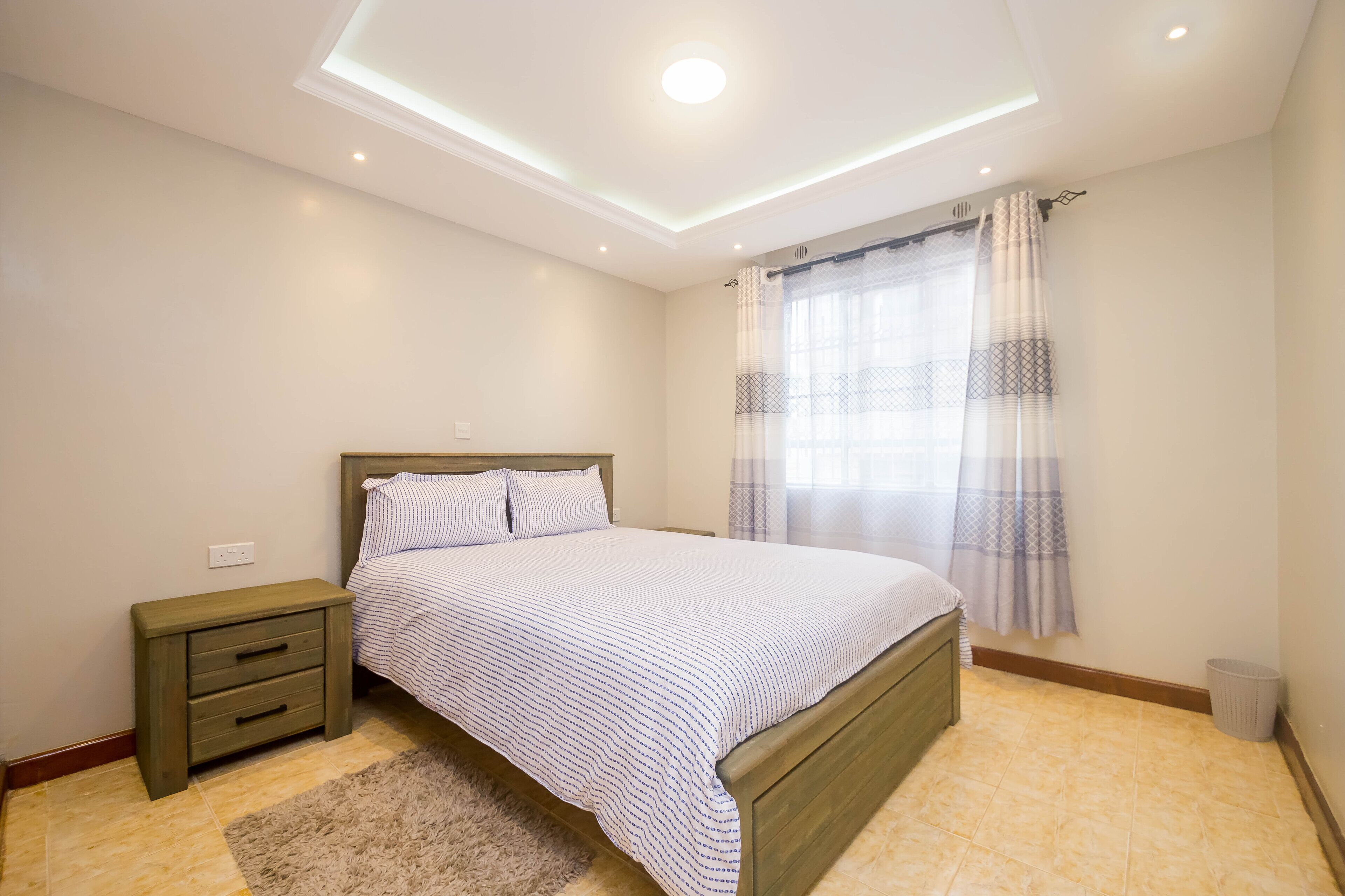 Apartamento, 2 quartos | Escrivaninha, Wi-Fi de cortesia, roupa de cama