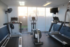 A gym with treadmills, an elliptical, and a stationary bike. - Island Princess 610 - Sunshine Sands (Fort Walton Beach)