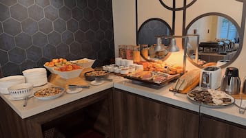 Daily buffet breakfast (USD 12.5 per person)