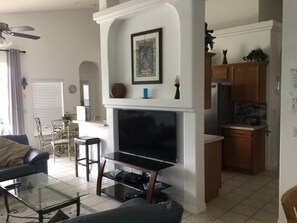 Smart TV, DVD player, foosball, books