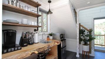 Fridge, microwave, stovetop, coffee/tea maker