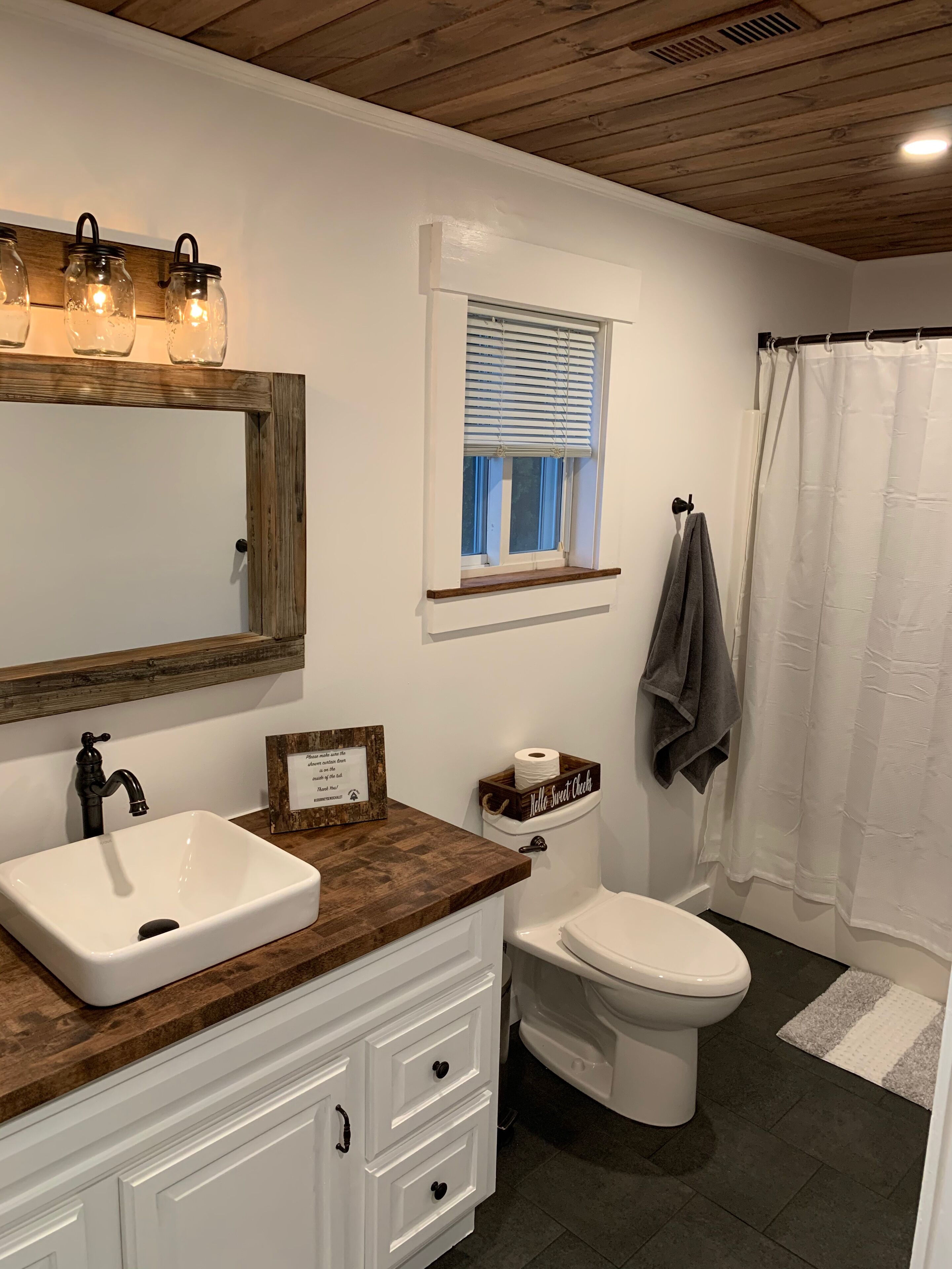 Combined shower/tub, hair dryer, towels, soap